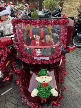Esme with her sister at Little Bridge House at Christmas